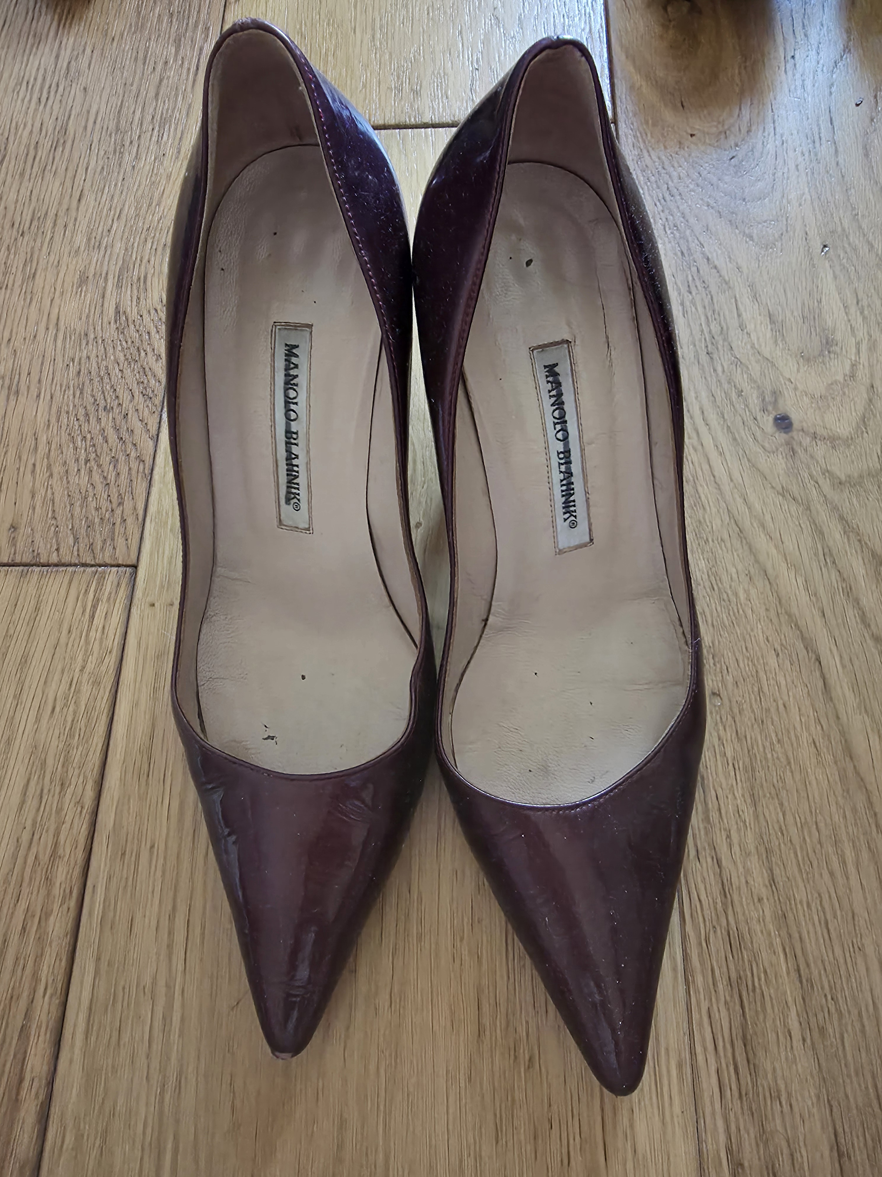 Manolo Blahnik Burgundy Patent Pumps by Manolo Blahnik