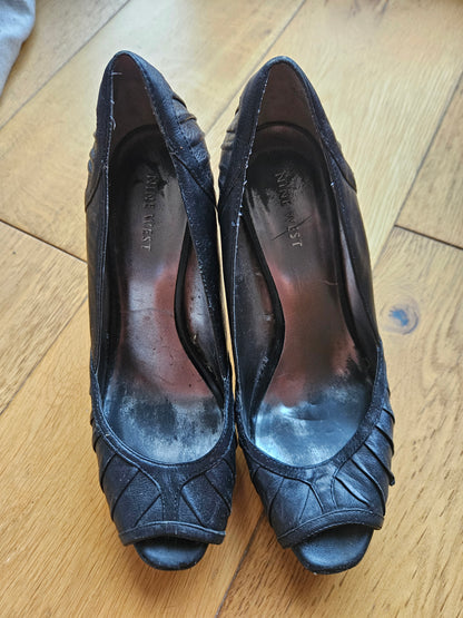 Black, peeped toe heels by Nine West - Heavily Worn / Size 5